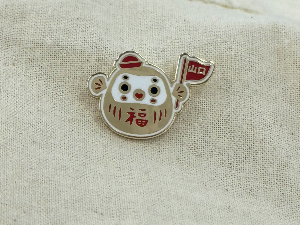 金ふくだるまピンバッチ 700円